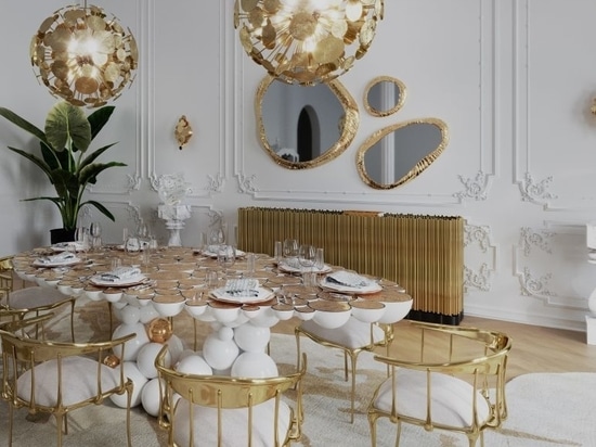 Adjacent to the living area is the dining space, a realm of opulence and grandeur. At its heart lies the Newton Dining Table, a resplendent vision in white and gold. It’s intricate design and sumpt...