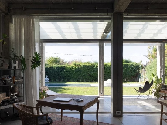 In Argentina, a grid of concrete columns is a matrix for an ever-evolving house