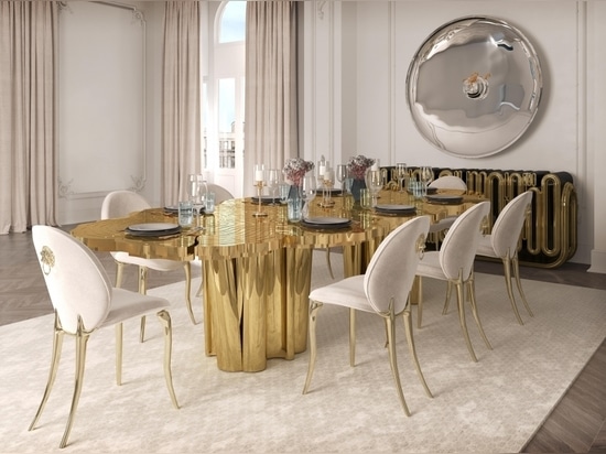 A dining room of unparalleled elegance, where the focal point is the exquisite brass dining table named Fortuna. Its gleaming surface, with rich brass tones, exudes a timeless charm that instantly ...