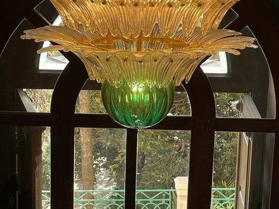 Chandelier with clear crystal palmette glass and green blown glass sphere