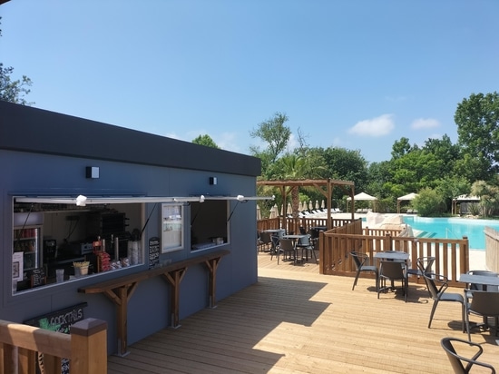 A bar inside a kiosk in a camping