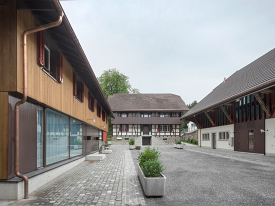 EM2N converts century-old Swiss farm into housing and office complex