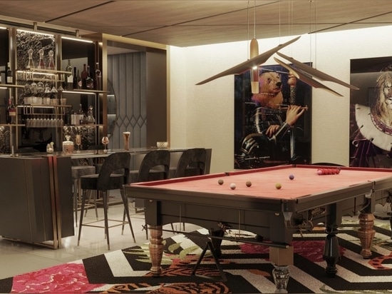 The game room with an adjacent bar is a space designed for leisure and entertainment. The highlight of this room is the Metamorphosis snooker table, which boasts a playful and remarkable design tha...