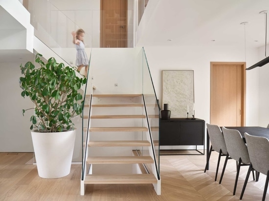 Black Accents Contrast The Wood And White Material Palette Of This Home