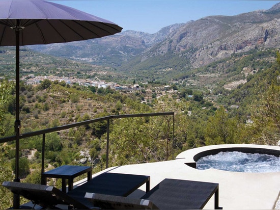 This Hotel Has 25 Cabins Built On A Spanish Hillside Overlooking A Valley