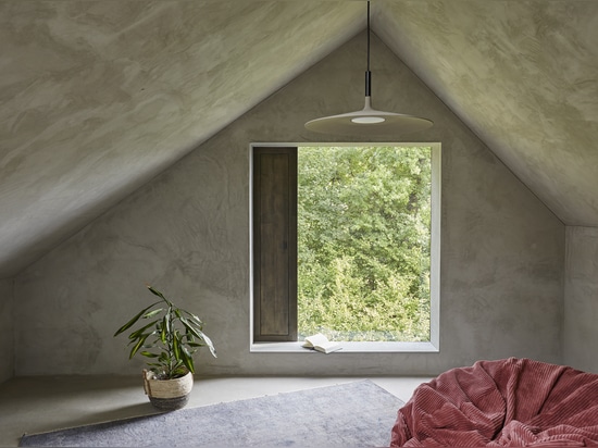 Concept, architecture, context: in Zurich, Diametro35 Inox Concrete by Ritmonio offers the most original interpretation of the style of this barn transformed into a home.