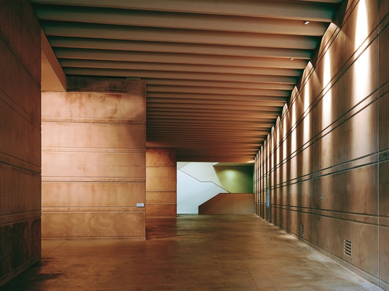 the gallery articulates the building with paths that lead to different spaces