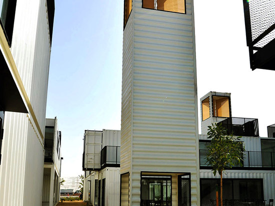 wind towers promote passive cooling within the development