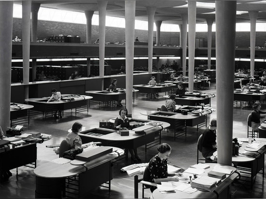 Clerks working in the Great Workroom of the Administration Building in the 1940s