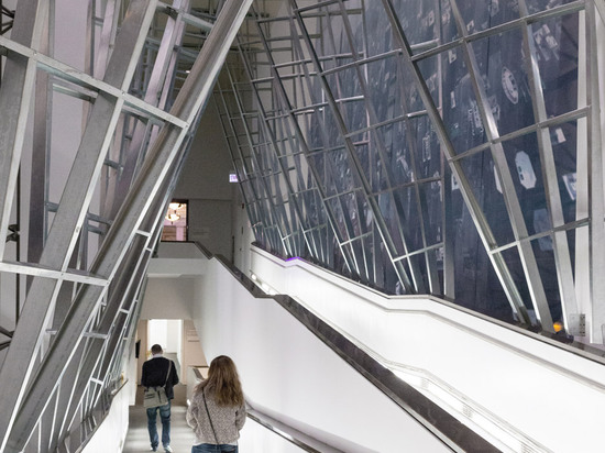 SO-IL uses steel studs to create a latticed archway inside Chicago Biennial headquarters