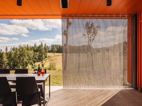 The Drift flexible wire mesh curtain adds stylish privacy to the Corollary Wine's tasting rooms.