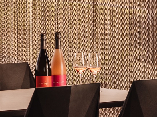 The Drift flexible wire mesh curtain adds stylish privacy to the Corollary Wine's tasting rooms.