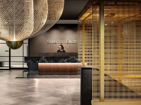 Using Banker M44-2 decorative wire mesh throughout the space, adding a touch of elegance and sophistication, the office redesign for Canadian law firm Stikeman Elliott blends hospitality and high-e...