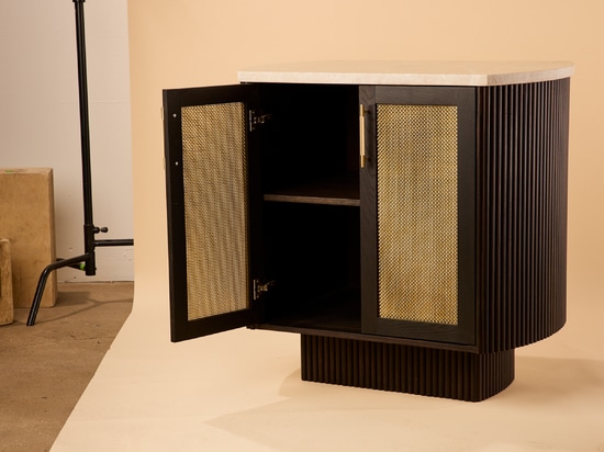 The Seaholm Cocktail Bar features Banker S-32 woven wire mesh in brass to match the cabinet's dark hardwood oak.