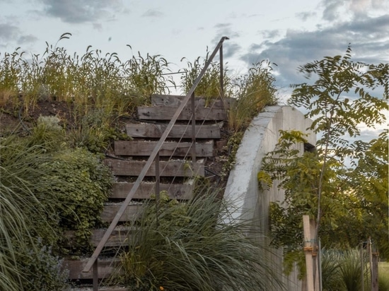 A House That Rises From The Ground Forming A Three-Level Garden