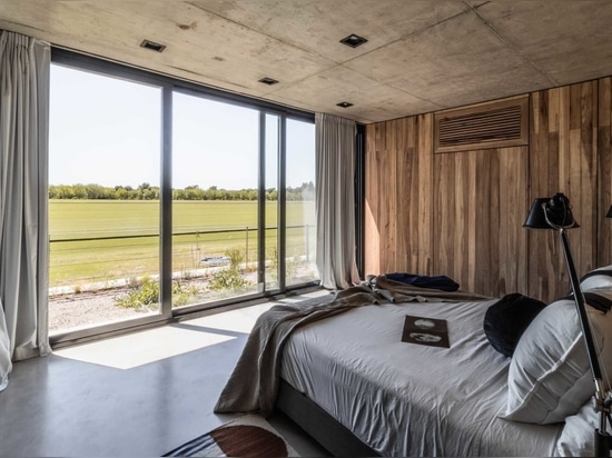 A House That Rises From The Ground Forming A Three-Level Garden