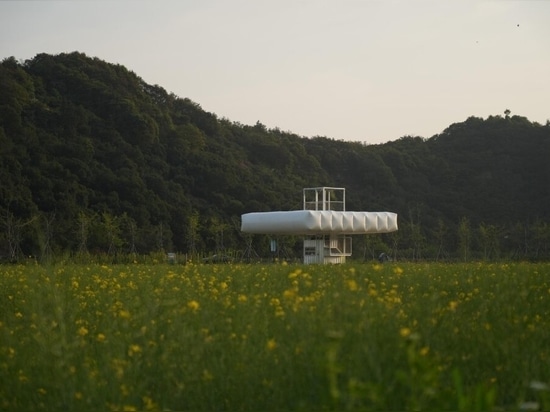Trio of inflated pavilions create rural café, cinema, and library amid rice fields in China