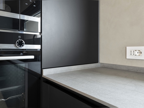 Toggle controls and Wi-Fi video intercom by AVE for a contemporary-style villa