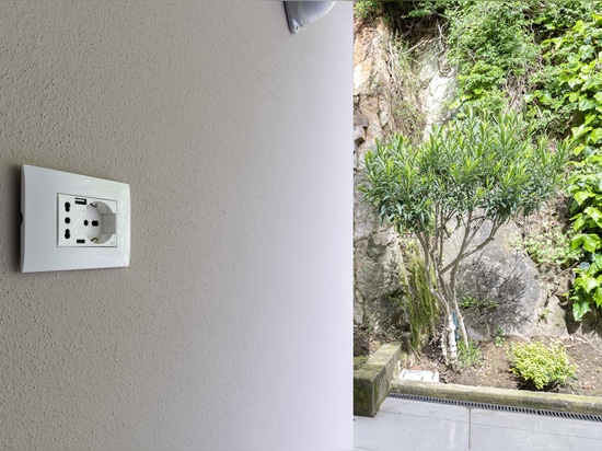 Toggle controls and Wi-Fi video intercom by AVE for a contemporary-style villa