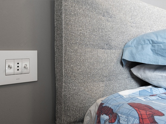 Toggle controls and Wi-Fi video intercom by AVE for a contemporary-style villa