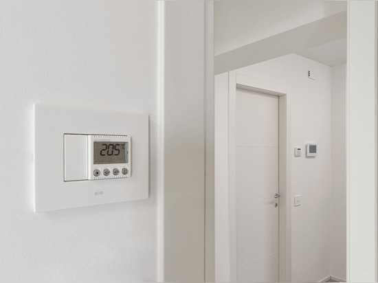 Toggle controls and Wi-Fi video intercom by AVE for a contemporary-style villa