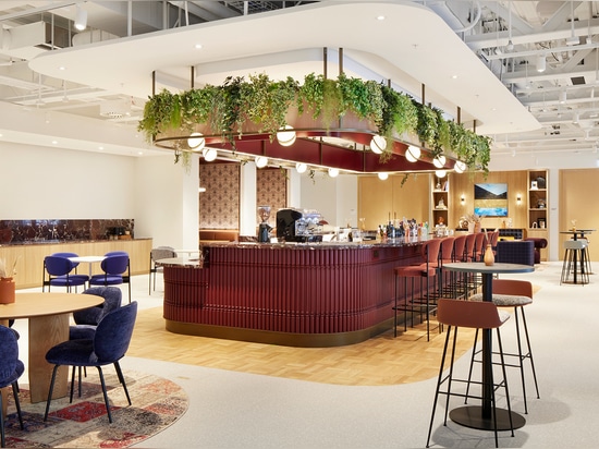 Sancroft Building showcasing modern architecture with abundant natural light, contemporary furnishings, and distinctive design elements such as  woven wire mesh from Banker Wire