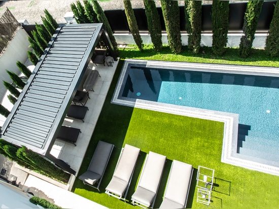 KE signs the poolside lounge and outdoor roof top of a villa in the centre of Madrid