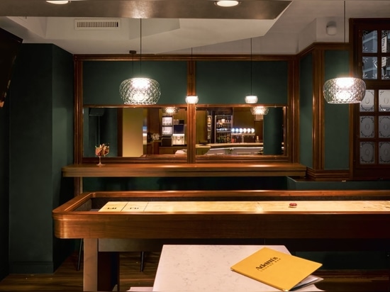Adam's Lounge Café unveils its custom Shuffleboard Pub.