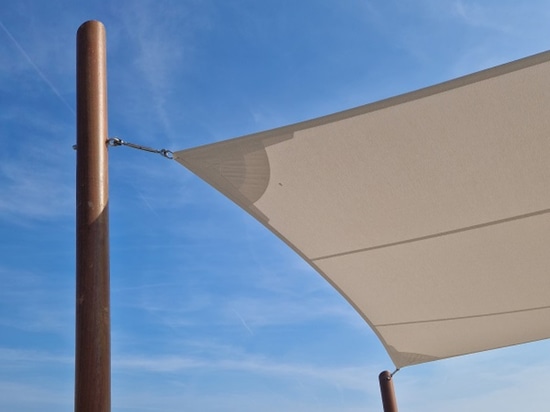 Polished wood mats and posts for shade sails