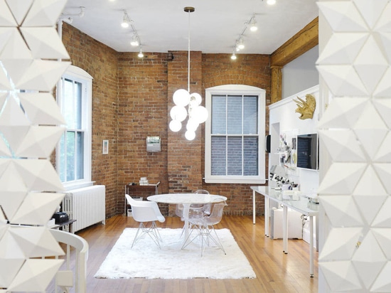 The spacious store is stylishly divided with two Facet room dividers