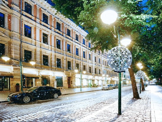 Openwork decorations and spruce balls for street lamps