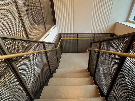 New York Stairwell: Woven Wire Mesh Meets Modern Luxury