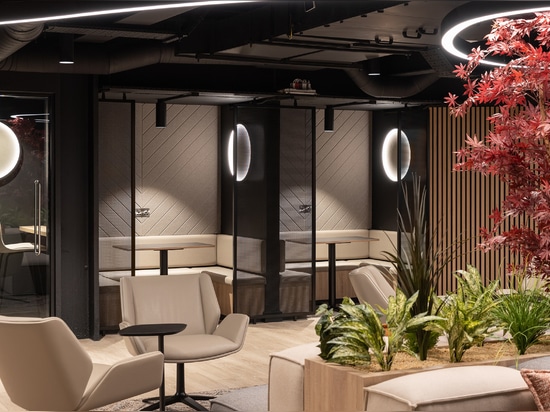 Woven wire mesh space dividers in Banker LPZ-71 create semi‑private seating booths at 58 Mosley Street, adding to the collaborative workplace atmosphere.