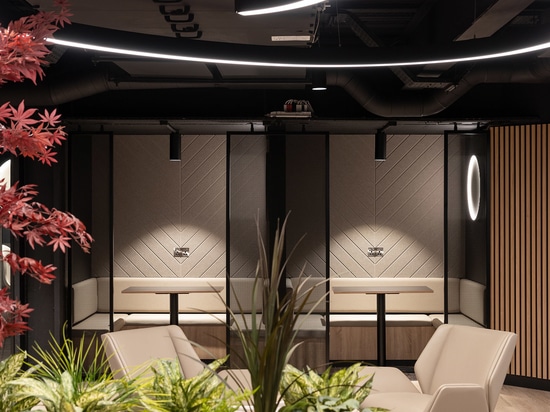 Woven wire mesh space dividers in Banker LPZ-71 create semi‑private seating booths at 58 Mosley Street, adding to the collaborative workplace atmosphere.