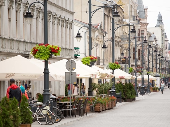Hanging flower planters for urban spaces: vertical greenery for cities