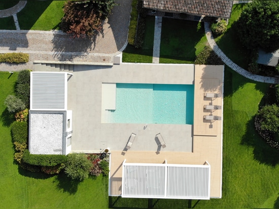 Architecture of shade and landscape design: KE and Myrtha Pools, for a private residence in Val Camonica