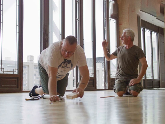 Installers at work during the parquet installation