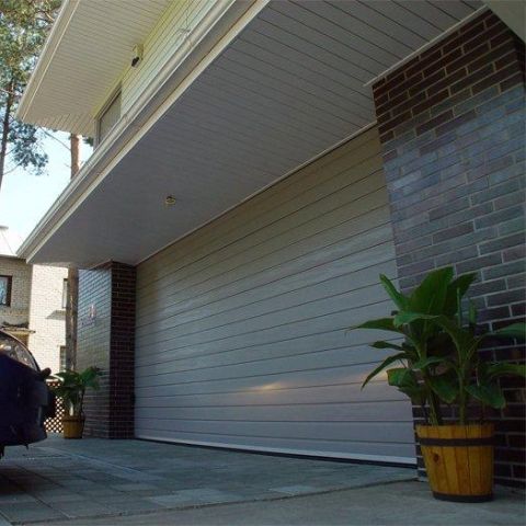 セクショナル車庫扉 - IDO-HOME - IDOMUS - スチール製 / 自動 / 絶縁