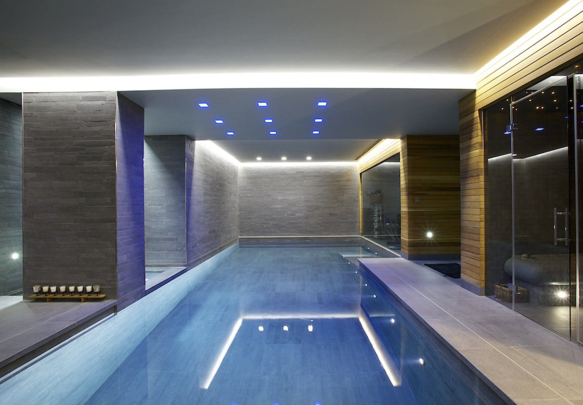 Piscina interna - GUNCAST SWIMMING POOLS - enterrada / em concreto