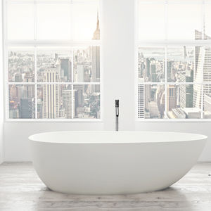 banheira freestanding / oval / em Solid Surface / em resina acrílica