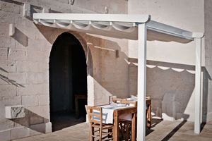 pérgola apoiada em parede