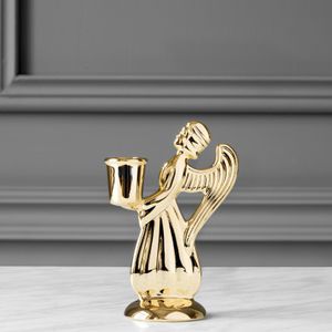 castiçal em latão banhado a ouro