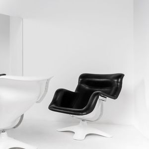poltrona contemporânea / em couro / em aço / com apoio para pés