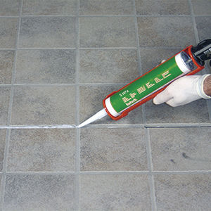 mástique elástico / à base de resina de silicone / de fixação / para piso