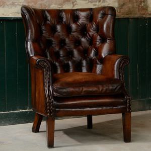 poltrona Chesterfield / em couro / de orelhas