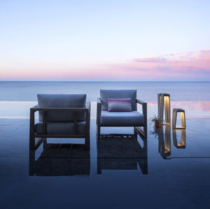 sofá contemporâneo / para ambiente externo / em Sunbrella® / em teca