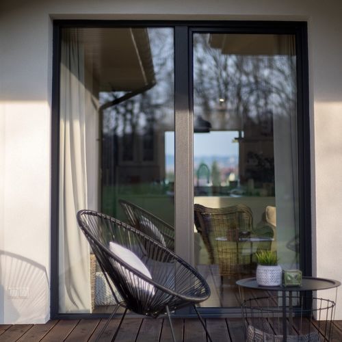 Porta de vidro de correr elevável - PRIMO - WISNIOWSKI - em PVC / com vidro duplo / com vidro triplo