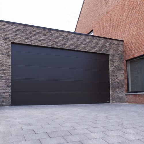 Portão seccionado para garagem - UNITHERM - WISNIOWSKI - em alumínio / automático / isolante