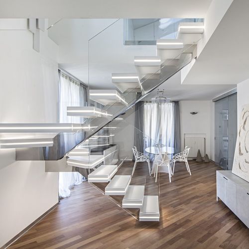 Escada em L - LUXO: SURFACE - Officine Sandrini - em U / com estrutura em aço inoxidável / da linha residencial