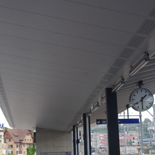 Painel acústico para forro de teto - TRAIN STATION SCHAFFHAUSEN - Bruag Design Factory AG - em fibra de madeira / retangular / perfurado